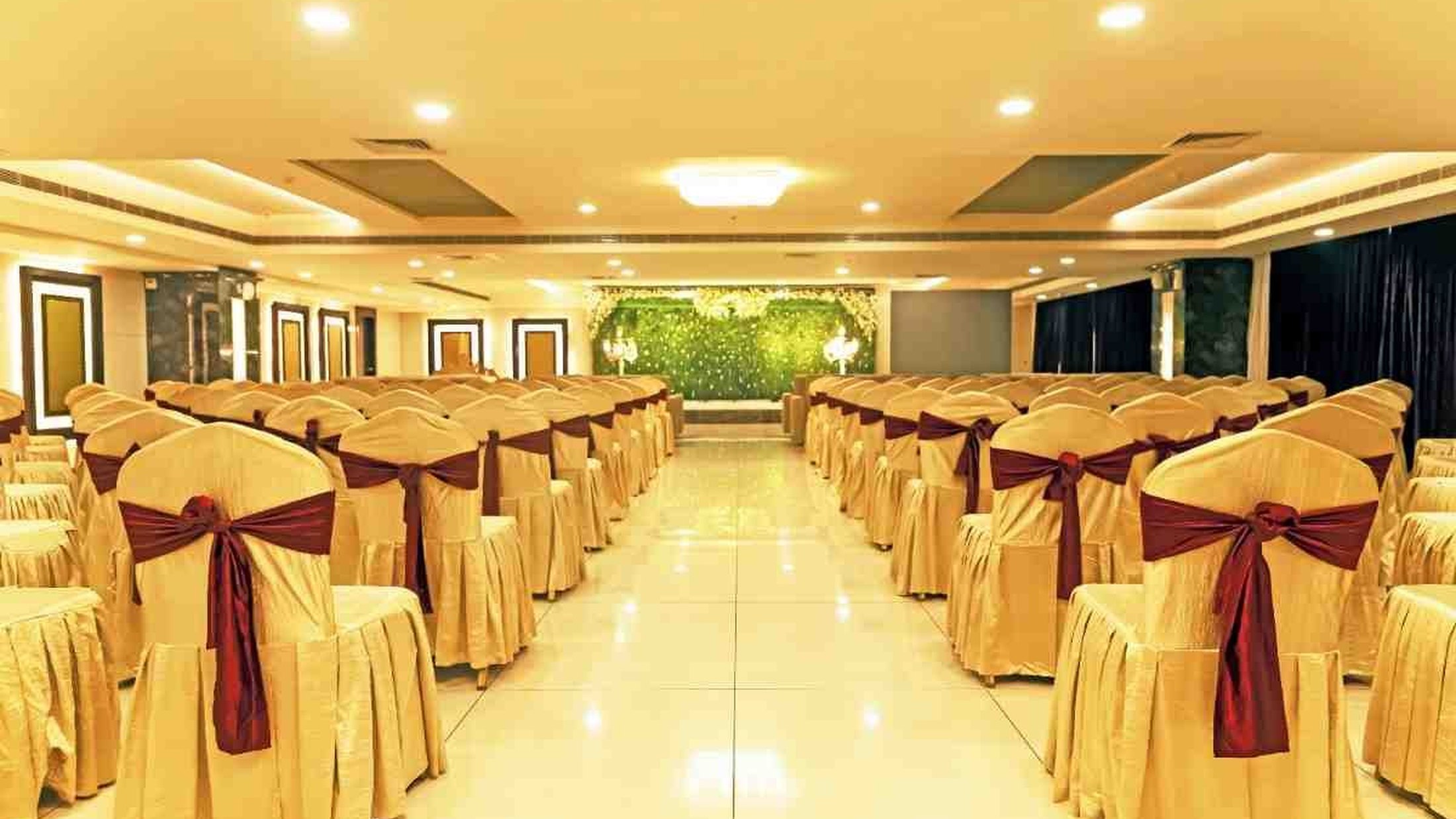 A banquet hall laid out for a wedding